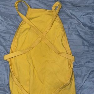 crossed back body suit